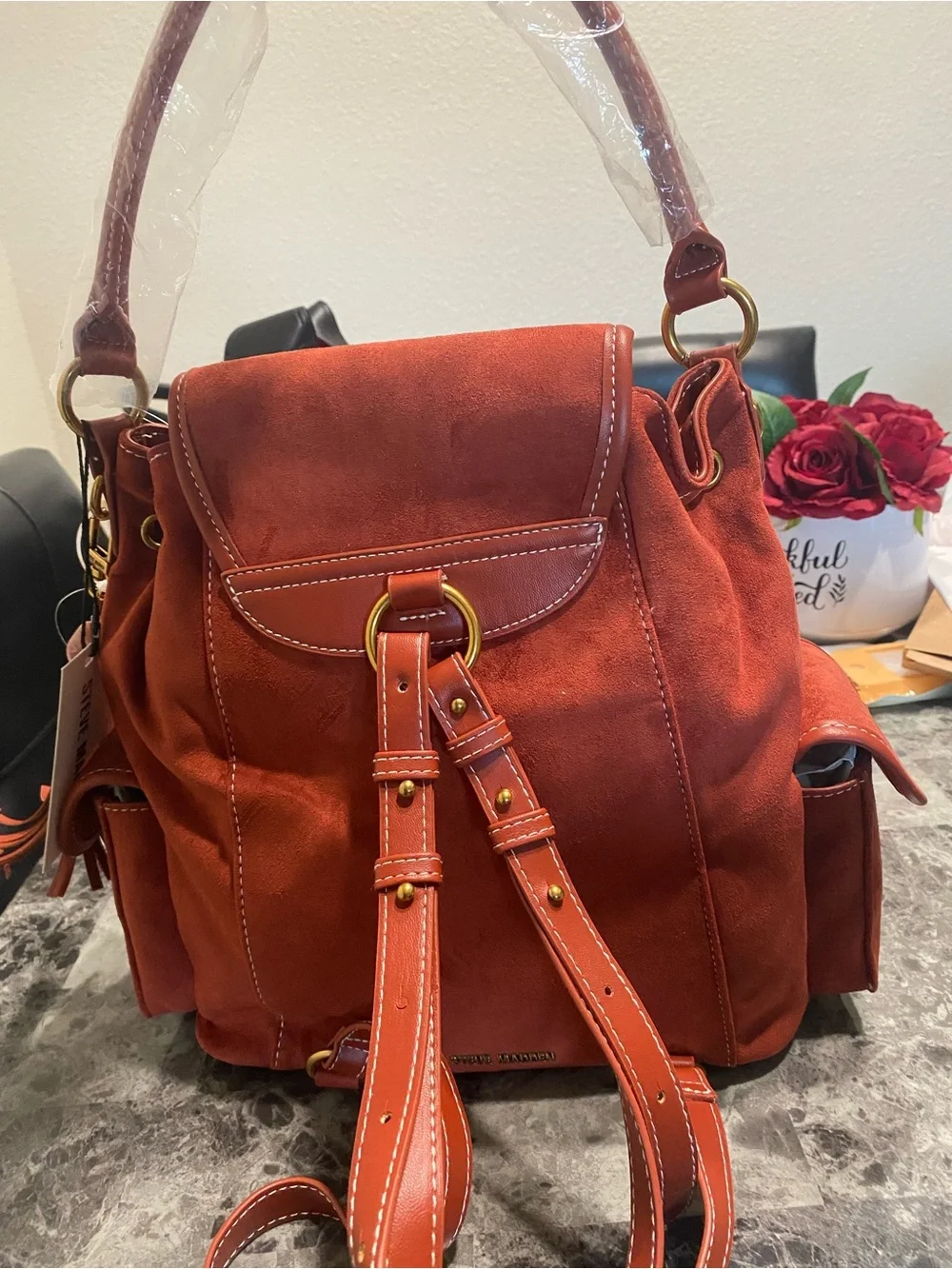 Steve Madden Burnt Orange Suede Drawstring Backpack